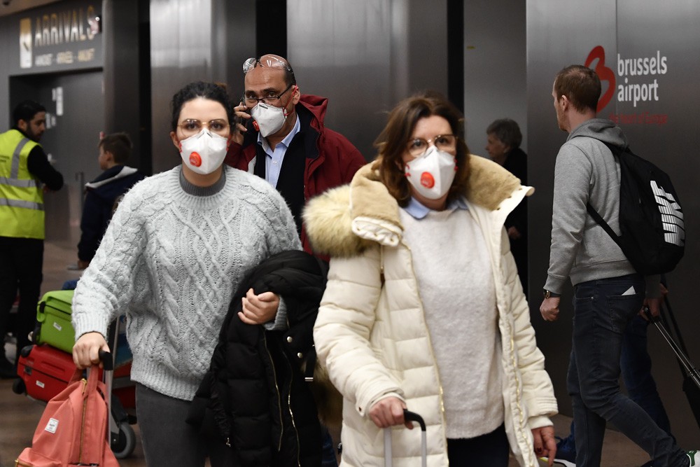 Mensen met mondmaskers