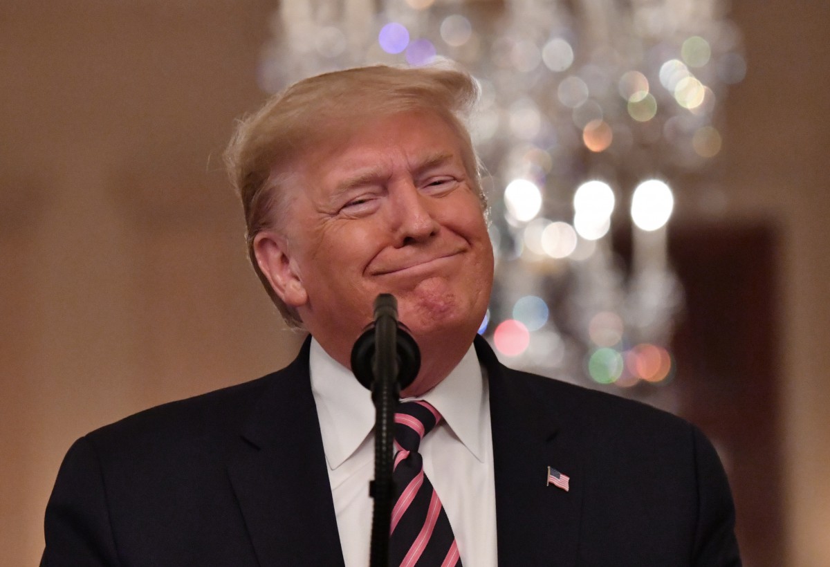 Donald Trump glimlacht