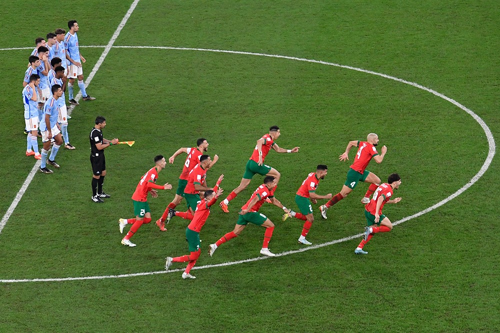 Marokko (in het rood) versloeg favoriet Spanje. Foto: AFP / G. Kirk